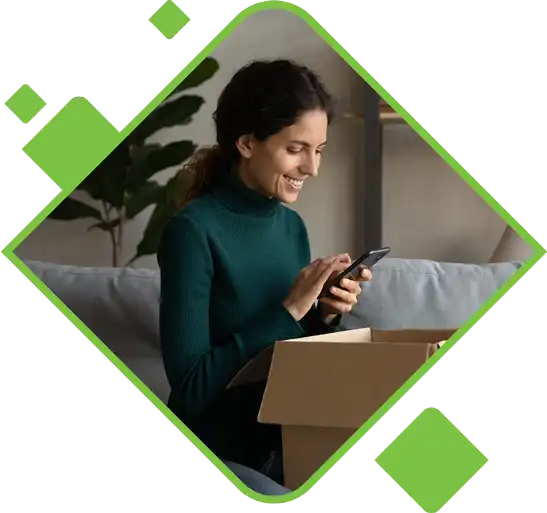 Satisfied customer leaving a review on her phone